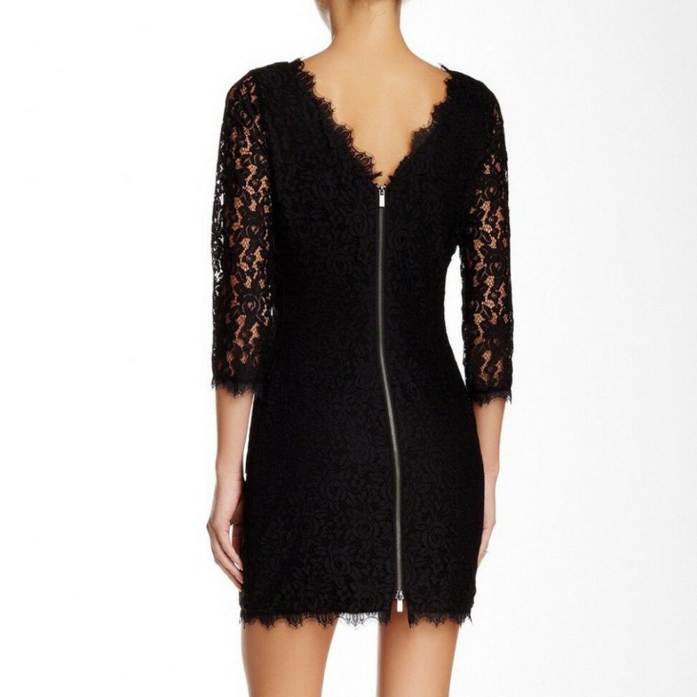 Extremely flattering Diane Von Furstenberg black mini lace dress size 4